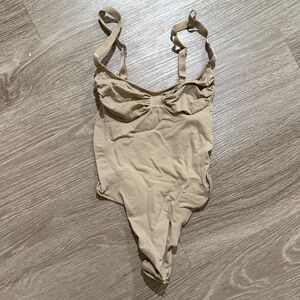 SKIMS Neutral One-Piece bodysuit